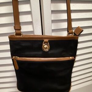 Michael Kors Black and Brown Crossbody Purse Bag. Adjustable strap.